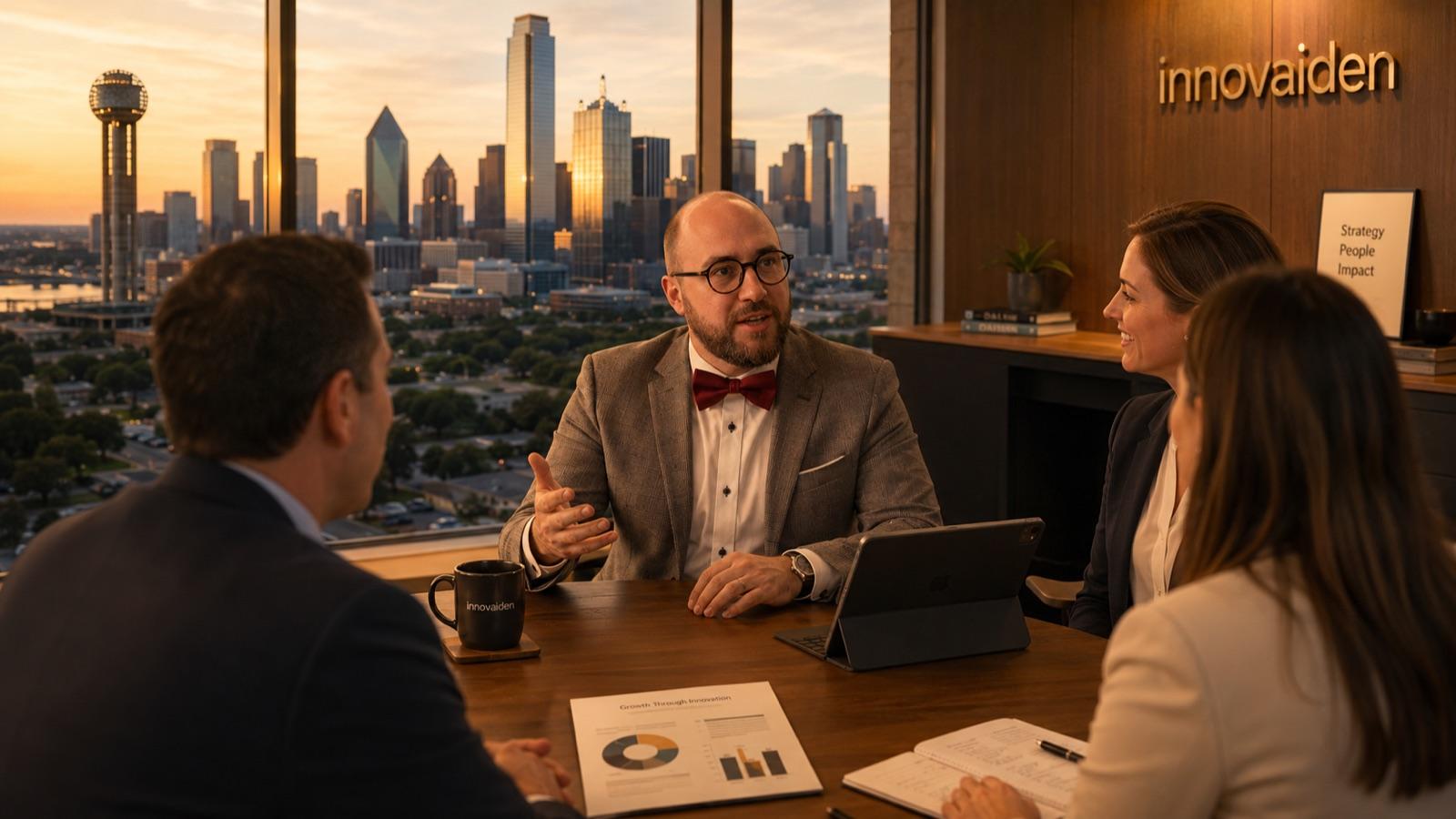 Dritan Saliovski and Innovaiden team in a working session at the Dallas office, with the Dallas skyline behind